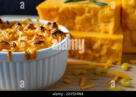 Baked macaroni and cheese in white oven dish.