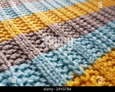Striped sweater background blue, gray, yellow stripes Stock Photo