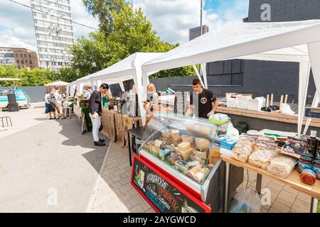 01 June 2019, Moscow, Russia: Showcase with cheese at the food festival Stock Photo