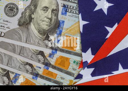 Dollars bills, cash pile and United States flag background texture Stock Photo