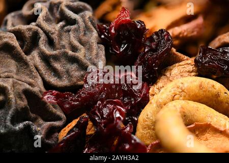 food as a background - whole grain wheat bagels with dried fruits Stock Photo