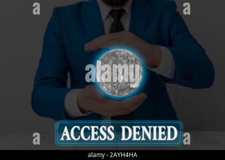 Handwriting text writing Access Denied. Conceptual photo error message shown when you do not have access rights Elements of this image furnished by NA Stock Photo