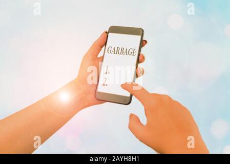 Handwriting text writing Garbage. Conceptual photo waste material or ...