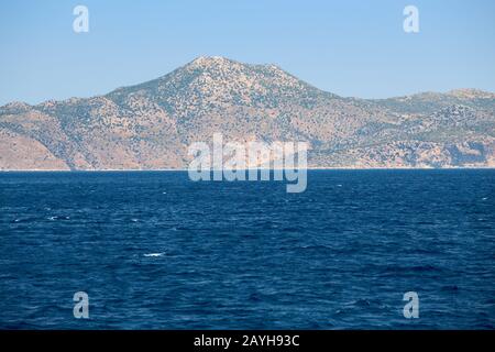 Mountain in Turkey distant view from the sea, as background Stock Photo