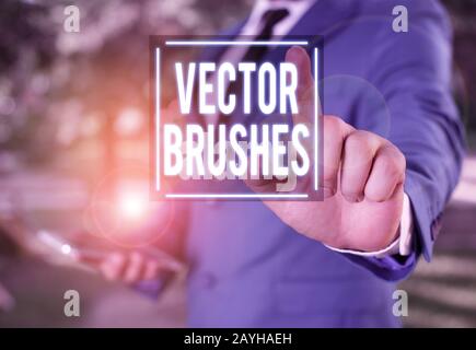 Handwriting text writing Brushes. Conceptual photo Applied to path and use to create realistic hand drawn effect Businessman with pointing finger in f Stock Photo