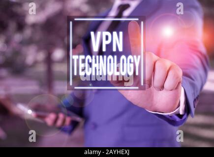Handwriting text writing Vpn Technology. Conceptual photo programming that creates a safe and encrypted connection Businessman with pointing finger in Stock Photo
