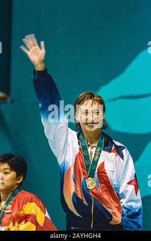 Amy Van Dyken (USA )wins the gold medal in the 100m butterfly at the 1996 Olympic Summer Games Stock Photo