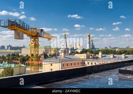 Modern urban construction in central Moscow, Russia. Moscow Kremlin in the background. Stock Photo