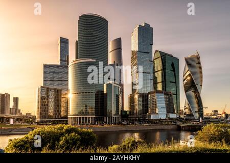 Moscow-City skyscrapers at sunset, Russia. Moscow-City is a business district on embankment of Moskva River. Modern tall buildings of Moscow in sunlig Stock Photo