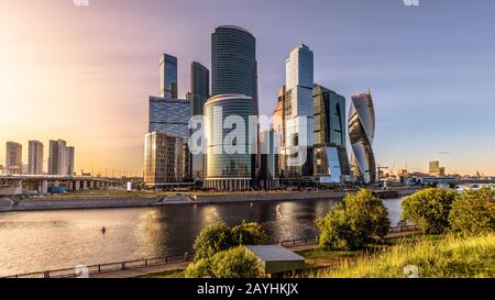 Moscow-City skyscrapers at sunset, Russia. Moscow-City is modern business district at Moskva River. Panoramic view of tall buildings in the Moscow cen Stock Photo