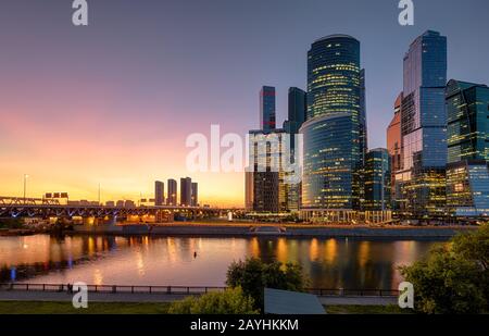 Panorama of Moscow with tall buildings of Moscow-City at night, Russia. Moscow-City is a new district at Moskva River. Scenic view of modern Moscow at Stock Photo