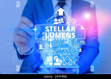 Conceptual hand writing showing Stellar Lumens. Concept meaning cryptocurrency platform that uses on remittance and payments Stock Photo