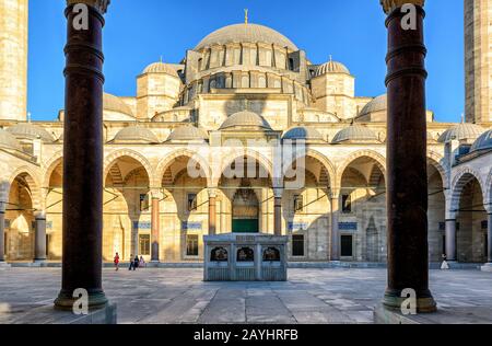 The inner courtyard of the Suleymaniye Mosque in Istanbul, Turkey. The Suleymaniye Mosque is the largest mosque in the city, and one of the best-known Stock Photo