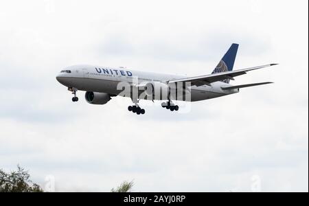 Heathrow, United Kingdom - August 03 2019:  United Airlines Boeing 777-222 registration N787UA, flight number UA930 arriving at Heathrow airport from Stock Photo