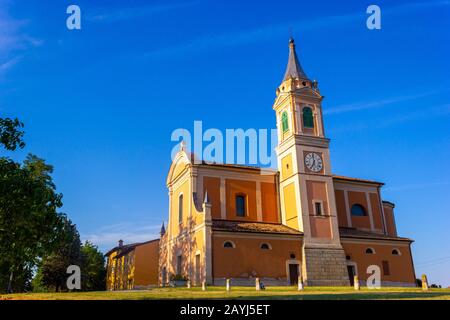 The church of St. Apollinar in Castello di Serravalle, Valsamoggia, Emilia Romagna, Italy, in a sunny day Stock Photo