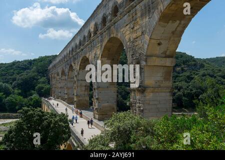 Detail of the arches of the Pont du Gard (UNESCO World Heritage Site), an ancient Roman aqueduct that crosses the Gardon River, near Nimes in the sout Stock Photo