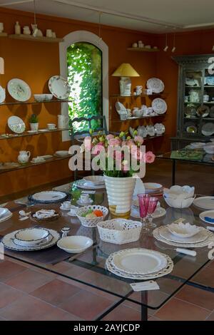 Handmade faience earthenware is being displayed at the Atelier Soleil, which is among the oldest and most authentic ceramic workshops in Provence, in Stock Photo