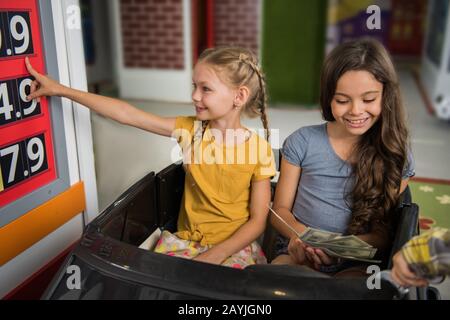 Kids at gas station. Stock Photo