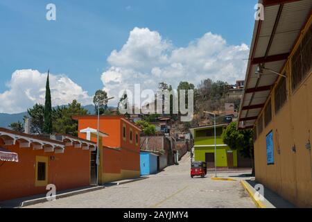 A street scene in Teotitlan del Valle, a small town in the Valles Centrales Region near Oaxaca, southern Mexico. Stock Photo