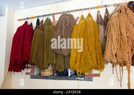 Wool dyed with natural dyes at a weavers home in Teotitlan del Valle, a small town in the Valles Centrales Region near Oaxaca, southern Mexico. Stock Photo