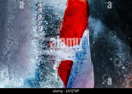 Illuminated ice block rich in frozen textures - contemporary abstract macro background Stock Photo