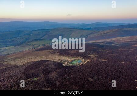 Rolling hills of Long Mynd at winter sunset in Shropshire, United Kingdom Stock Photo