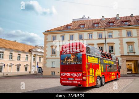 Vilnius, Lithuania - August 10, 2019 : City tour sightseeing bus at Simonas Daukantas Square