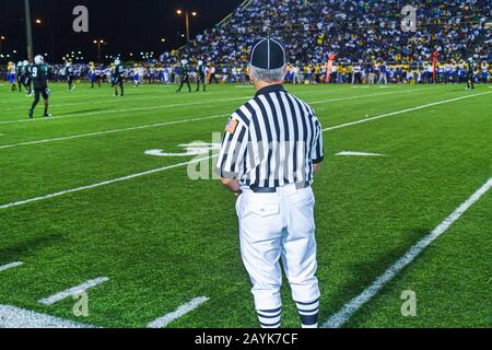Miami Florida,Miami Dade College North Campus,Traz Powell Stadium,high school football playoff game,Northwestern vs. Central,referee,official,striped Stock Photo