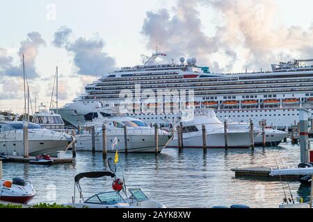 Miami Beach Florida,Biscayne Bay water,Miami Beach,Marina,Carnival Valor,cruise ship,departing,boats,visitors travel traveling tour tourist tourism la Stock Photo