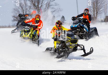 Toronto, Canada. 15th Feb, 2020. Riders compete during the Snowmobile Lite race of the 2020 Royal Distributing Snowcross Races in Innisfil, Ontario, Canada, Feb. 15, 2020. Credit: Zou Zheng/Xinhua/Alamy Live News Stock Photo