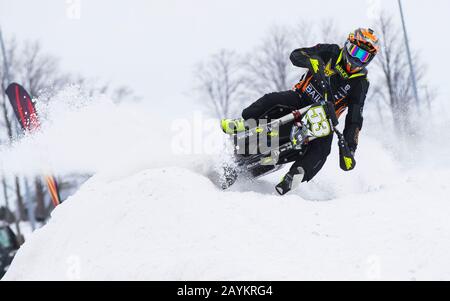 Toronto, Canada. 15th Feb, 2020. Yanick Boucher of Canada competes during the Snowmobile Lite race of the 2020 Royal Distributing Snowcross Races in Innisfil, Ontario, Canada, Feb. 15, 2020. Credit: Zou Zheng/Xinhua/Alamy Live News Stock Photo