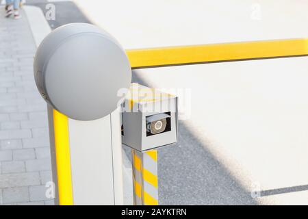 Automatic car barrier gate with Surveillance Camera, security and access control Stock Photo