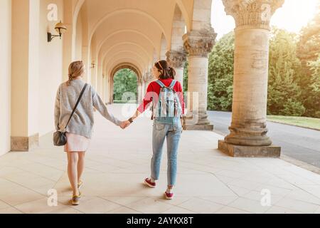 Tourists couple travel in old medieval monastery Stock Photo