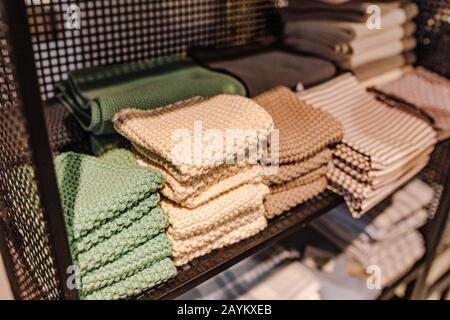 Pile of knitted fabrics for sale Stock Photo