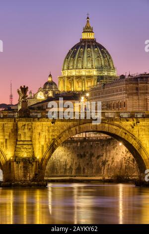 The St. Peters Basilica in the Vatican City, Italy, at twilight Stock Photo