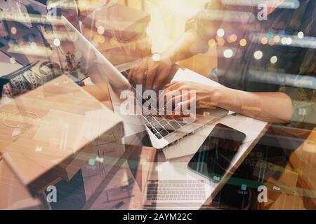 Seamstress works to new clothes ordered by internet client Stock Photo