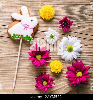 Easter gingerbread rabbit on wooden background Stock Photo