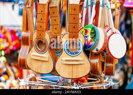 Many Ukuleles for sale on a market Stock Photo