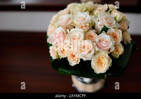 bride's wedding bouquet in composition Stock Photo