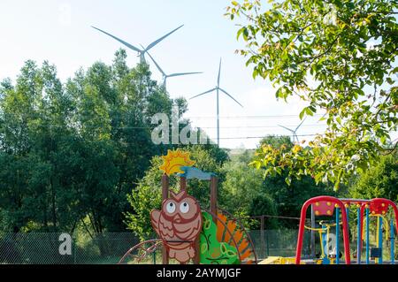 wind turbines and the environment of a beautiful sunny day Stock Photo