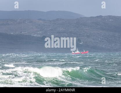 Goats Path, Bantry, Cork, Ireland. 16th February, 2020. French trawler Croix Morand is one of forty fishing boats that took shelter to ride out the effects of Storm Dennis in Bantry Bay, Co. Cork, Ireland. - Credit; David Creedon / Alamy Live News Stock Photo