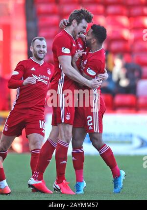 Aberdeen's Ashton Taylor (centre) celebrates scoring his sides first