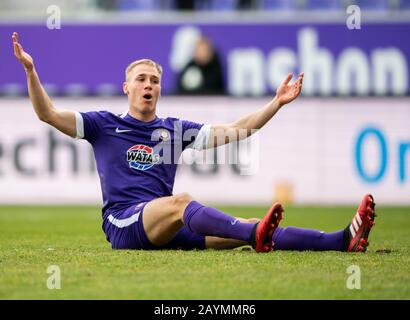 Aue, Germany. 16th Feb, 2020. Football: 2nd Bundesliga, FC Erzgebirge Aue - Holstein Kiel, 22nd matchday, at the Sparkassen-Erzgebirgsstadion. Aues Florian Krüger sits on the ground and rides his arms out. Credit: Robert Michael/dpa-Zentralbild/dpa - IMPORTANT NOTE: In accordance with the regulations of the DFL Deutsche Fußball Liga and the DFB Deutscher Fußball-Bund, it is prohibited to exploit or have exploited in the stadium and/or from the game taken photographs in the form of sequence images and/or video-like photo series./dpa/Alamy Live News