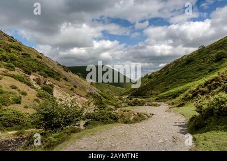 Looking down a path in Carding Mill Valley on the Long Mynd near Church Stretton in the Shropshire Hills, England, UK Stock Photo