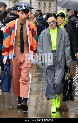 London, UK. 16th Feb, 2020. Street fashion at Victoria Beckham London Fashion Week 2020 catwalk show. British fashion designer and former Spice Girl presents her autumn/winter collection at Banqueting House, London London, UK - 16 February 2020 Credit: Nils Jorgensen/Alamy Live News Stock Photo