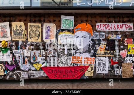 Posters and graffiti from the political unrest and protests in Lastarria, Central Santiago, Metropolitan Region, capital city of Chile, South America Stock Photo
