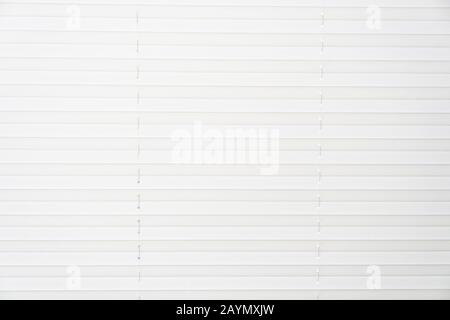 White venetian blind with horizontal stripes Stock Photo