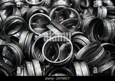 Metal pieces background. metal stamping industry. Industrial background . Stock Photo