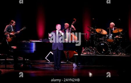 Tony Bennett performs at the Broward Center for the Performing Arts in Fort Lauderdale, Florida. His daughter Antonia opened the show with her own bri Stock Photo