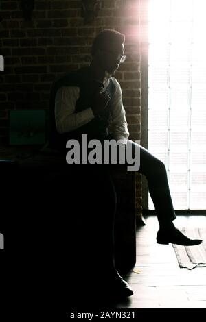 Handsome African American man with sophisticated style hiding among ...